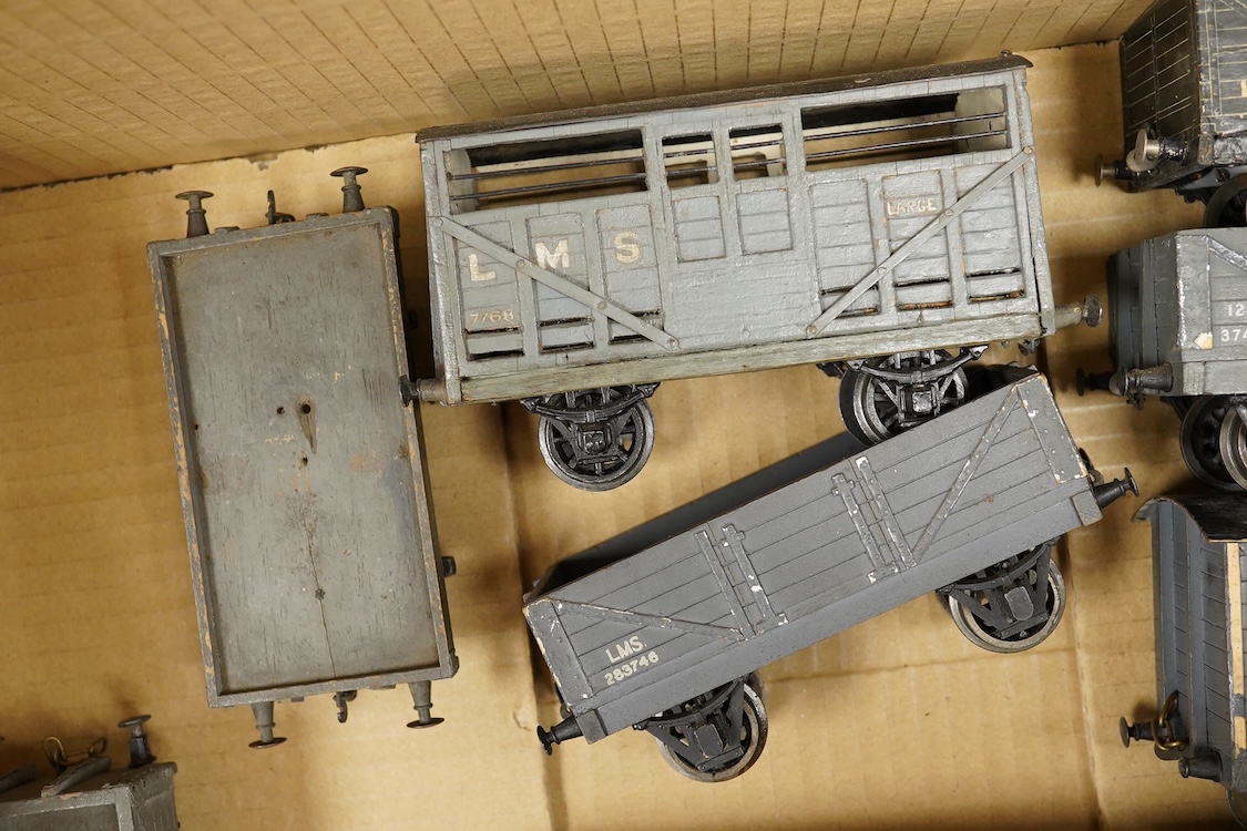 Seven 0 gauge coarse scale LMS and a private owner’s freight wagons, mainly of wood construction, together with the remains of a Tri-ang Big Big Train Class 35 Hymek diesel locomotive (8)